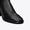 Cap-Toe Heeled Ankle Boot