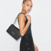 T Monogram Pebbled Shoulder Bag